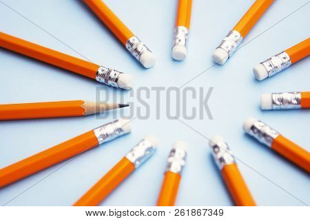 Mock Up Ready For Adding Text. Business Or Educational Concept. Yellow Pencils On Blue Background. I