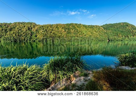Lago Di Levico (lake) With Mountain And Forest, Levico Terme,  Italy, Europe