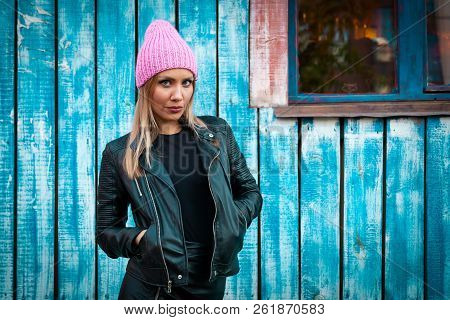Portrait Female Student On Bright Background. Beautiful Modern Urban Young Woman Wearing Pink Knitti