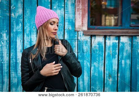 Portrait Female Student On Bright Background. Beautiful Modern Urban Young Woman Wearing Pink Knitti