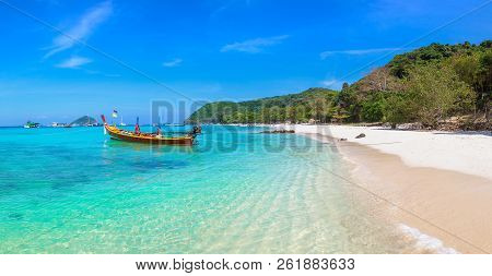 Panorama Of Traditional Long Tail Boat On Coral (ko He) Island Near Phuket Island, Thailand In A Sum