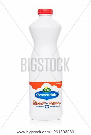 London, Uk - October 05, 2018: Plastic Bottle Of Arla Cravendale Skimmed Milk Red Label On White.