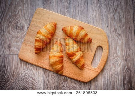 A Rich Variety Of Food Photography Croissant.
Delicious Croissants On A Square White Plate On A Wood