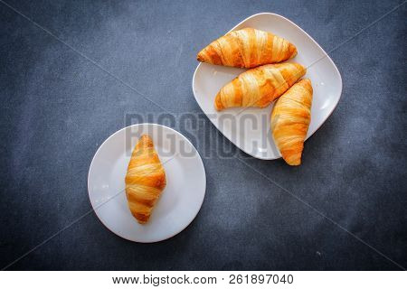 A Rich Variety Of Food Photography Croissant.
One Delicious Croissant On A Dessert White Plate On Da