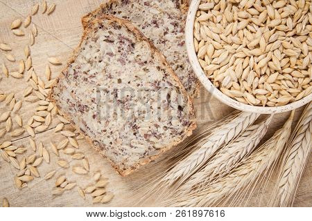Multi-grain Bread On A Wooden Background. Healthy Food Concept.