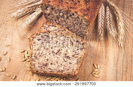 Multi-grain Bread On A Wooden Background. Healthy Food Concept.