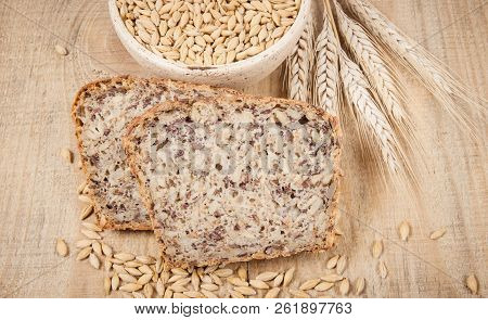 Multi-grain Bread On A Wooden Background. Healthy Food Concept.