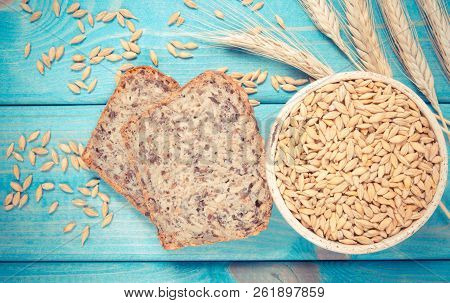 Multi-grain Bread On A Wooden Background. Healthy Food Concept.