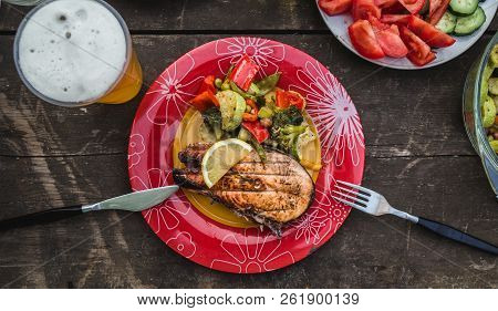 Grilled Salmon Steak With Vegetables On Plate Tasty And Healthy Dinner.