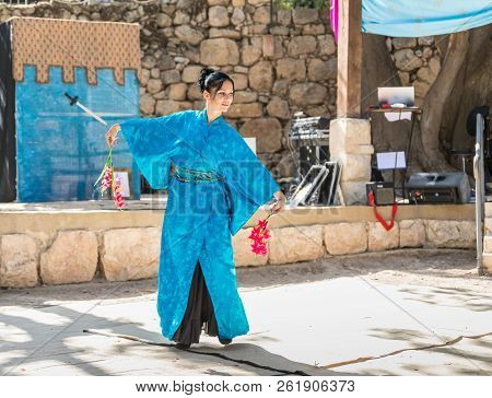 Jerusalem, Israel, September 29, 2018 : Dancer In National Japanese Attire Dancing Japanese Dance At