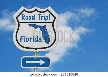 Florida Road Trip Highway Sign, Florida Map And Text Road Trip On A Highway Sign With Sky Background
