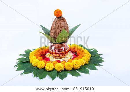 Copper Kalash With Coconut , Leaf And Floral Decoration On A White Background. Essential In Hindu Pu