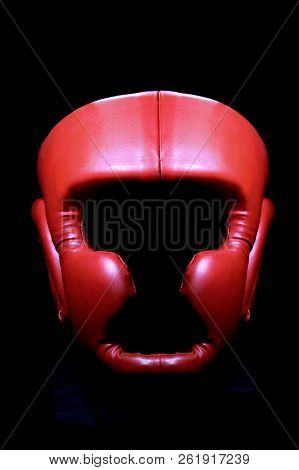 Red Boxing Headguard Isolate In Black Background