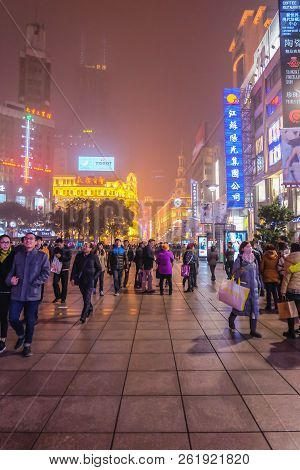 Shanghai/china -  January 24 2015: Night Life Of People Walking In Nanjing Road Walking Street In Sh