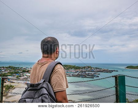 Asisn Fat Backpacker Stand On Top Of  Khao Ma Jor Pier  With Idyllic Ocean Beautiful White Cloud End