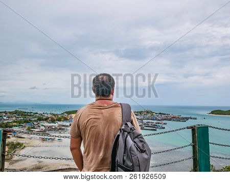 Asisn Fat Backpacker Stand On Top Of  Khao Ma Jor Pier  With Idyllic Ocean Beautiful White Cloud End