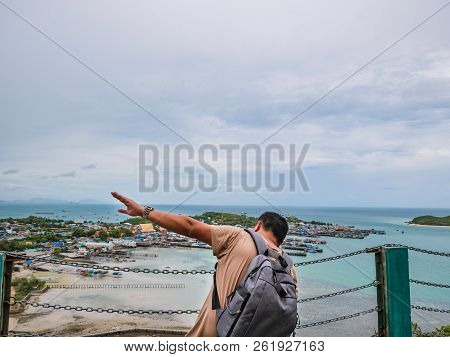 Asisn Fat Backpacker Stand On Top Of  Khao Ma Jor Pier  With Idyllic Ocean Beautiful White Cloud End