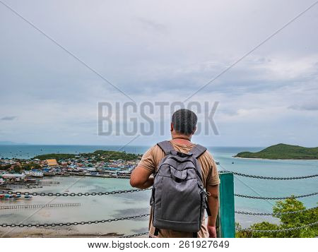 Asisn Fat Backpacker Stand On Top Of  Khao Ma Jor Pier  With Idyllic Ocean Beautiful White Cloud End