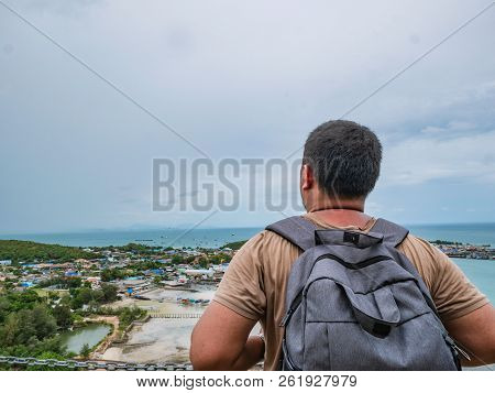 Asisn Fat Backpacker Stand On Top Of  Khao Ma Jor Pier  With Idyllic Ocean Beautiful White Cloud End