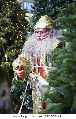Portrait Of Happy Santa Claus Holding Sack With Gifts