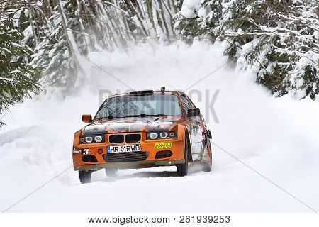 Covasna, Romania - January 14-15, 2017: Unknown Pilots Competing In Winter Rally Covasna 2017 On Jan