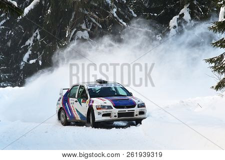 Covasna, Romania - January 14-15, 2017: Unknown Pilots Competing In Winter Rally Covasna 2017 On Jan