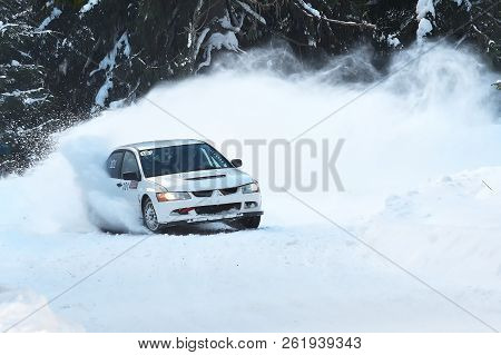 Covasna, Romania - January 14-15, 2017: Unknown Pilots Competing In Winter Rally Covasna 2017 On Jan