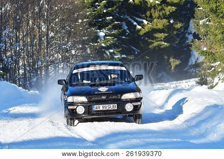 Covasna, Romania - January 14-15, 2017: Unknown Pilots Competing In Winter Rally Covasna 2017 On Jan
