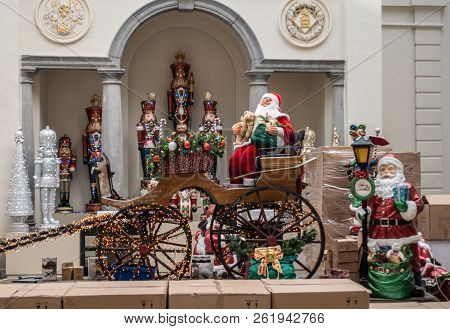 Antwerp, Belgium - September 24, 2018: Santa Claus Mannequin In Carriage Display Surrounded By Small