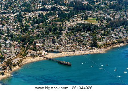 The Aerial View Of The Beach With Tourists In The City Of Capitola In Northern California, Close To 