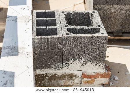 Close Up Of Grey Airbrick With Holes. Industrial Construction Site Objects Concept.