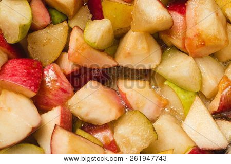 Ripe Apples And Pears Cooked In Sugar Syrup. Process Of Making Jam Marmalade At Home.