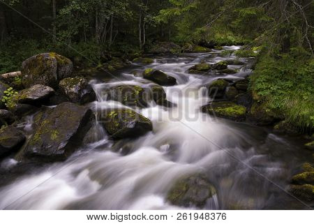 Tefafallet Waterfall Near The Swedish Village Ljusnedal