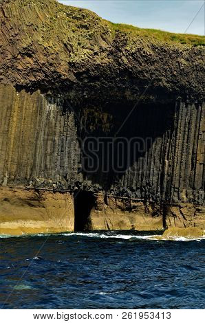 A View Of The Prehistoric Volcanic Geological Rock Formations On The Scottish Island Of Staffa
