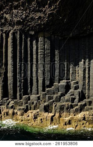 A View Of The Prehistoric Volcanic Geological Rock Formations On The Scottish Island Of Staffa