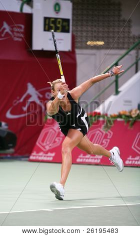 Australske tennisstjerne Alicia Molik i aktion mod Justine Henin, på i Qatar Total Open, Doha, 