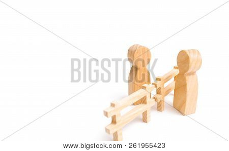 Two People Are Talking Over The Fence. People Spread Rumors And Lies. The Concept Of Good Neighborli