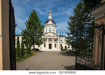 Kolomna, Russia. Church Of Michael Archangel With Open Gate Under Blue Sky In Sunny Day In Summer.
