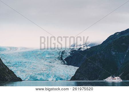 View Of Holgate Glacier In Kenai Fjords National Park - Unidentifiable Ship Sails Close To The Glaci
