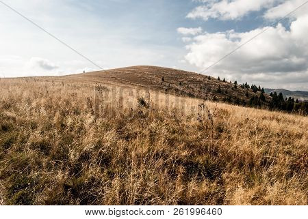 Autumn Mountain Meadows With Blue Sky And Clouds And Other Hills On The Background - View To Kecka H
