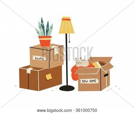 Moving To A New Home. The Family Moved To A New Home. Paper Cardboard Boxes With Various Household I