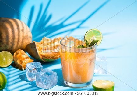 Exotic Fruit Juice From Bel Fruit Or Wooden Apple Called In India Bel Ka Sharbat. Cold Fruit Drink W