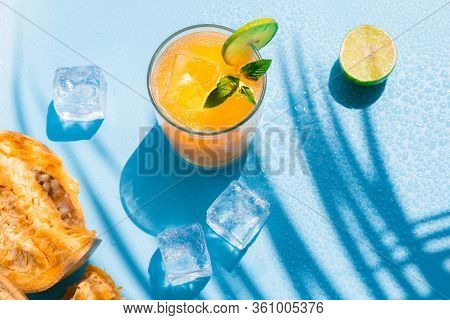 Exotic Fruit Juice From Bel Fruit Or Wooden Apple Called In India Bel Ka Sharbat. Cold Fruit Drink W