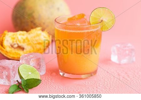 Exotic Fruit Juice From Bel Fruit Or Wooden Apple Called In India Bel Ka Sharbat. Cold Fruit Drink W