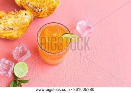 Exotic Fruit Juice From Bel Fruit Or Wooden Apple Called In India Bel Ka Sharbat. Cold Fruit Drink W