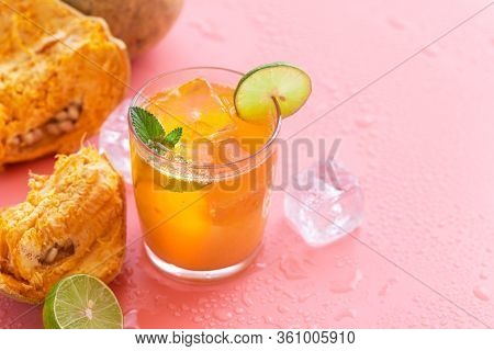 Exotic Fruit Juice From Bel Fruit Or Wooden Apple Called In India Bel Ka Sharbat. Cold Fruit Drink W