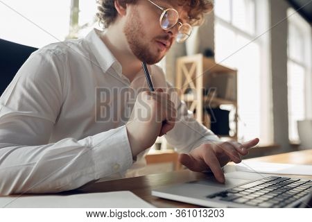 Close Up. Caucasian Young Man In Business Attire Working In Office. Young Businesswoman, Manager Doi