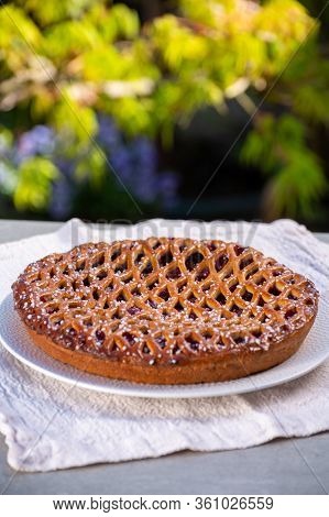 Cherry Pie With Dough Lattice From Limburg, Netherlands Served In Sunny Garden