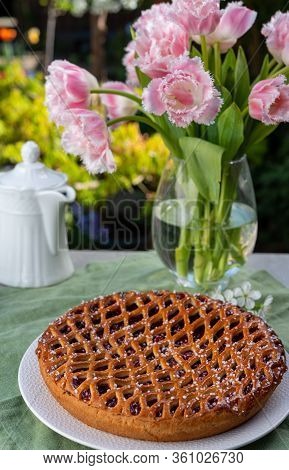 Cherry Pie With Dough Lattice From Limburg, Netherlands Served In Sunny Garden