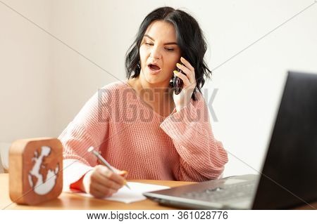Young Woman Works From Home, Concept Of Remote Work, Work On The Internet, Stayed At Home